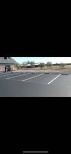An asphalt parking lot