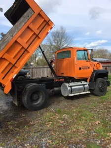An orange dump truck